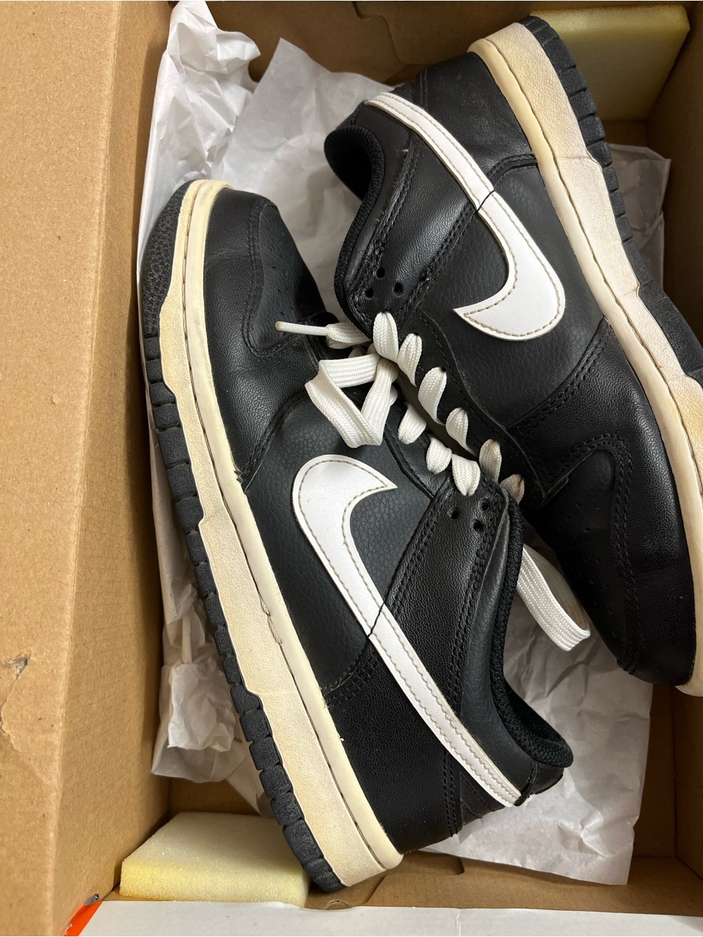 Nike Black and White Low-Top Leather Sneakers